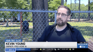 Kevin Young, Founder of Pro-How AI, interviewed on WMBF News (NBC Myrtle Beach) about how social media AI bots flag content for policy violations, speaking outdoors at Bark Park South in Myrtle Beach, SC.